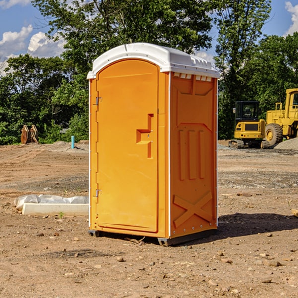 how often are the porta potties cleaned and serviced during a rental period in Roberts WI